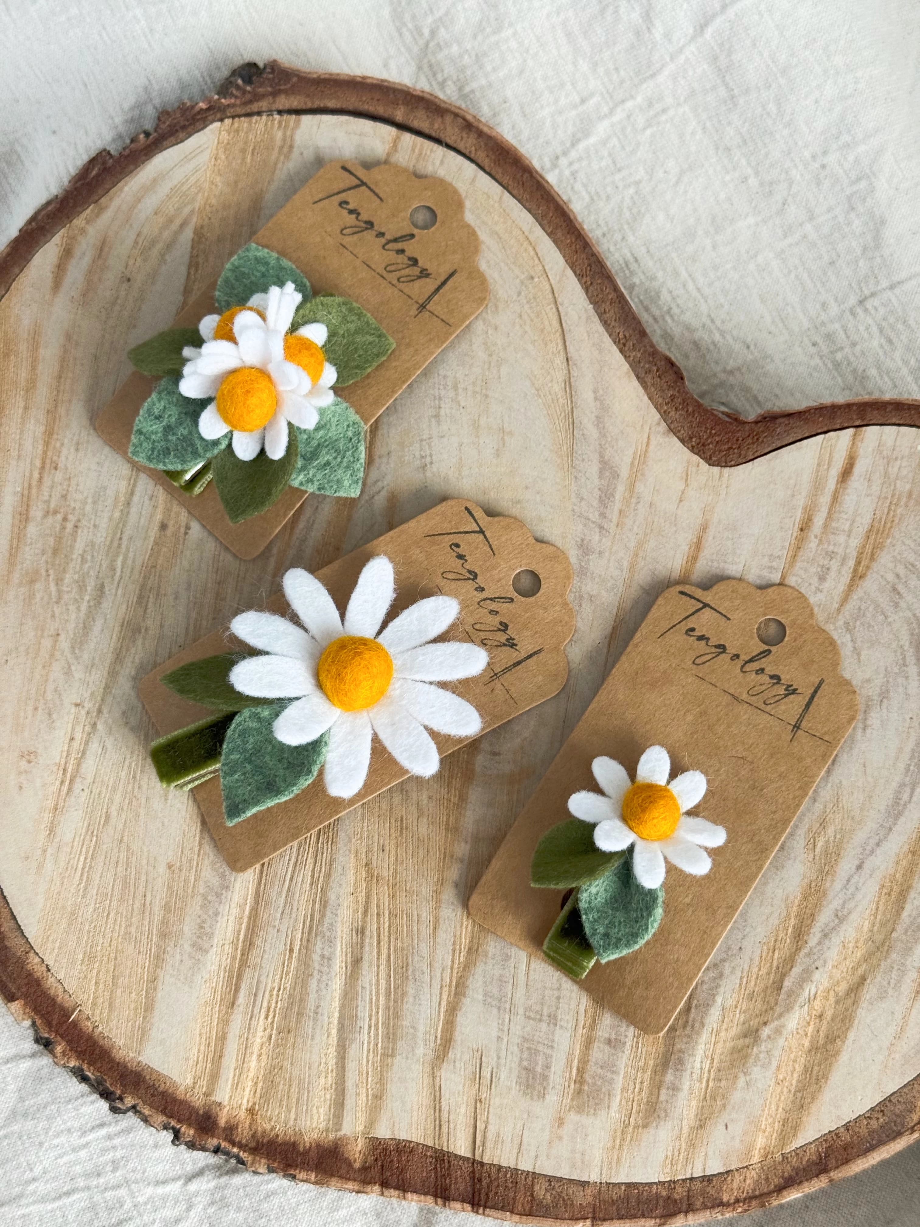 Three Daisy Hair Clip designs together