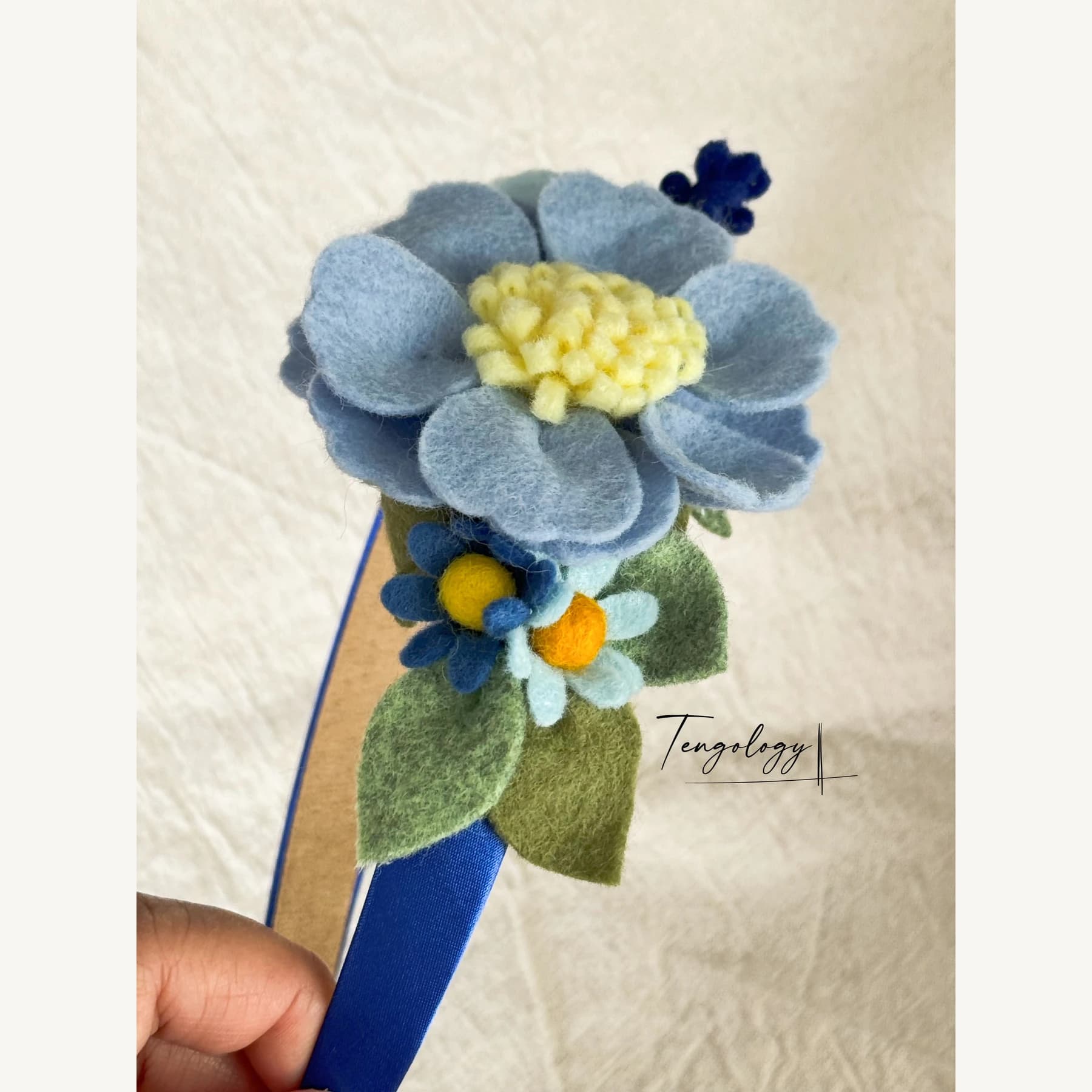 Felt Flower Garden Headband — Pale blue / yellow centre