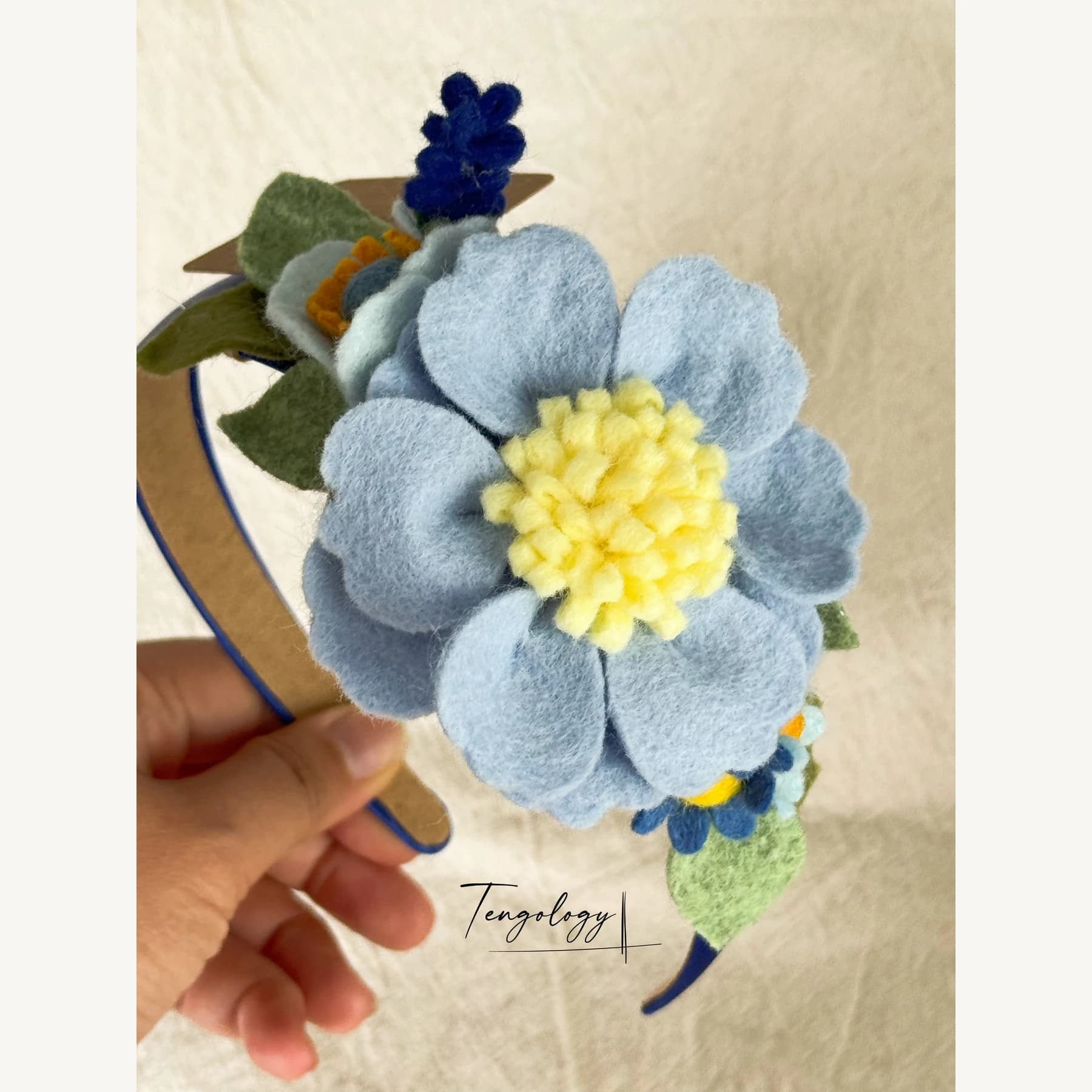 Felt Flower Garden Headband — Pale blue / yellow centre