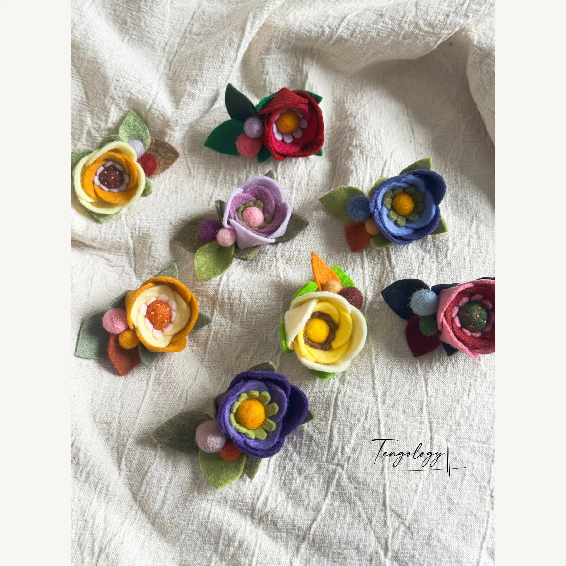 Layered felt flower brooch — Colourways together, alternate view