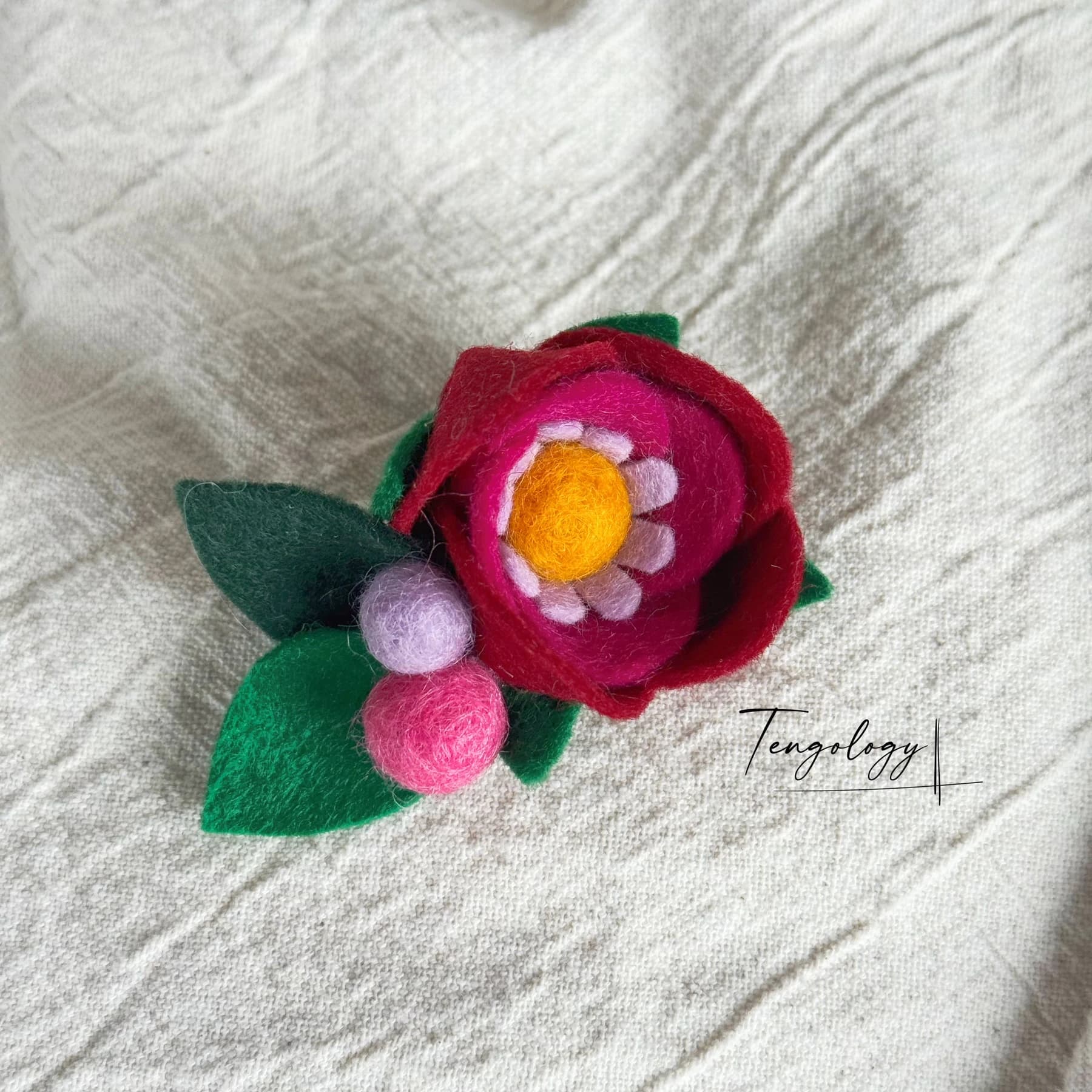 Layered felt flower brooch — Burgundy, front