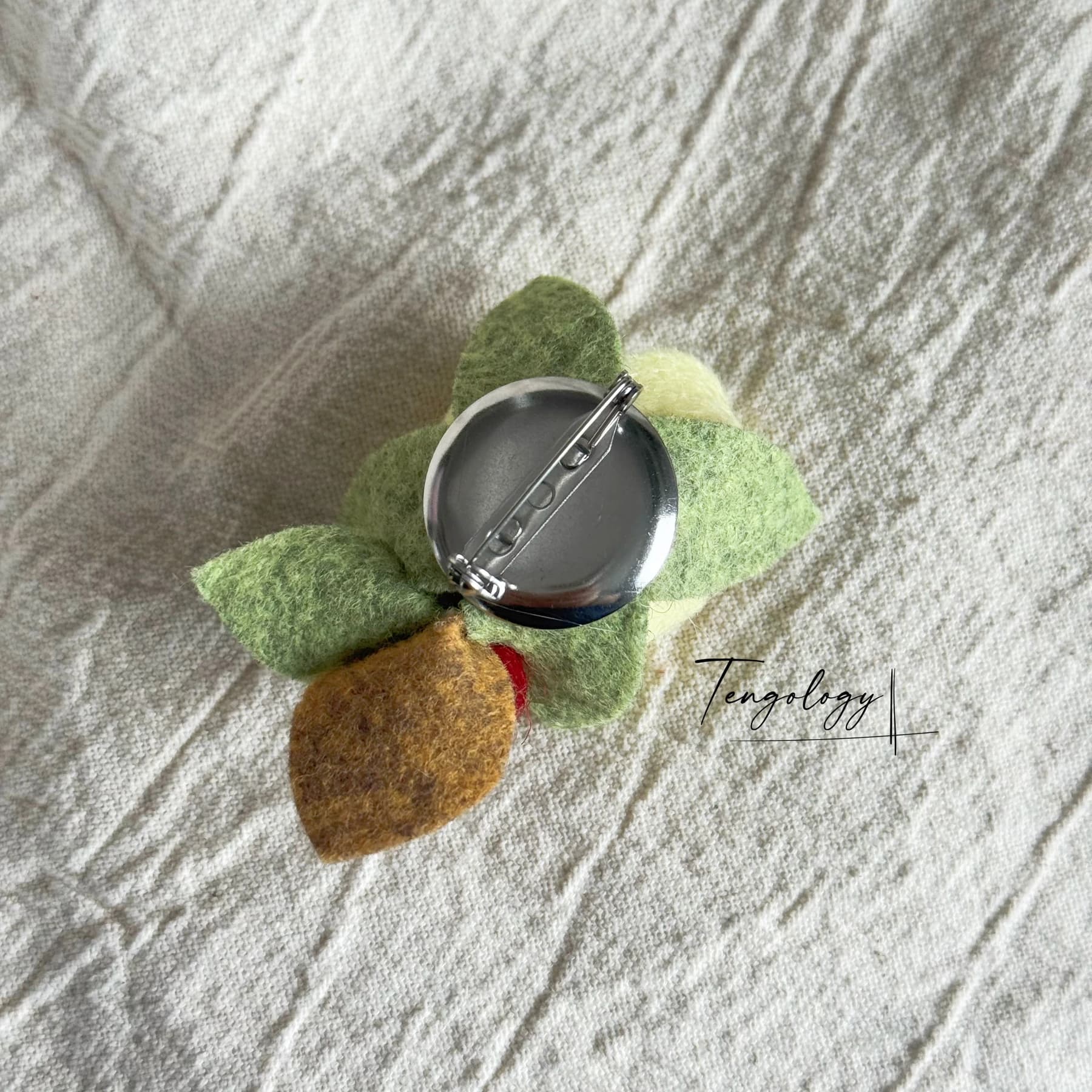 Layered felt flower brooch — Pale yellow / ochre, pin back
