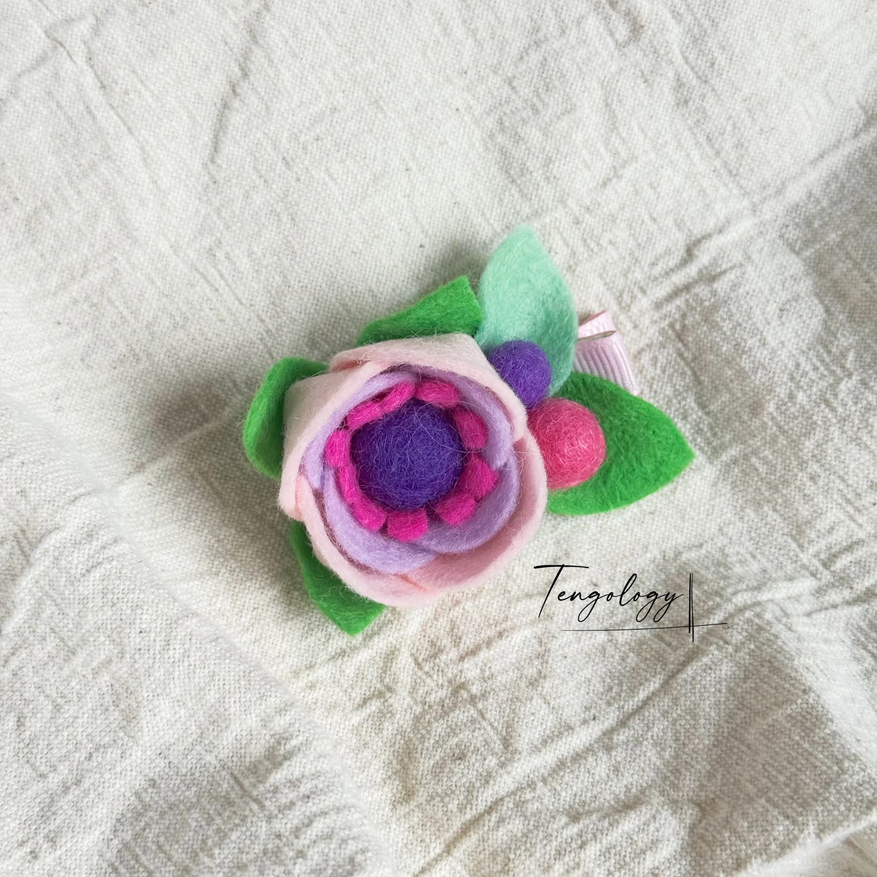 Layered felt flower hair clip — Lilac / purple centre, front