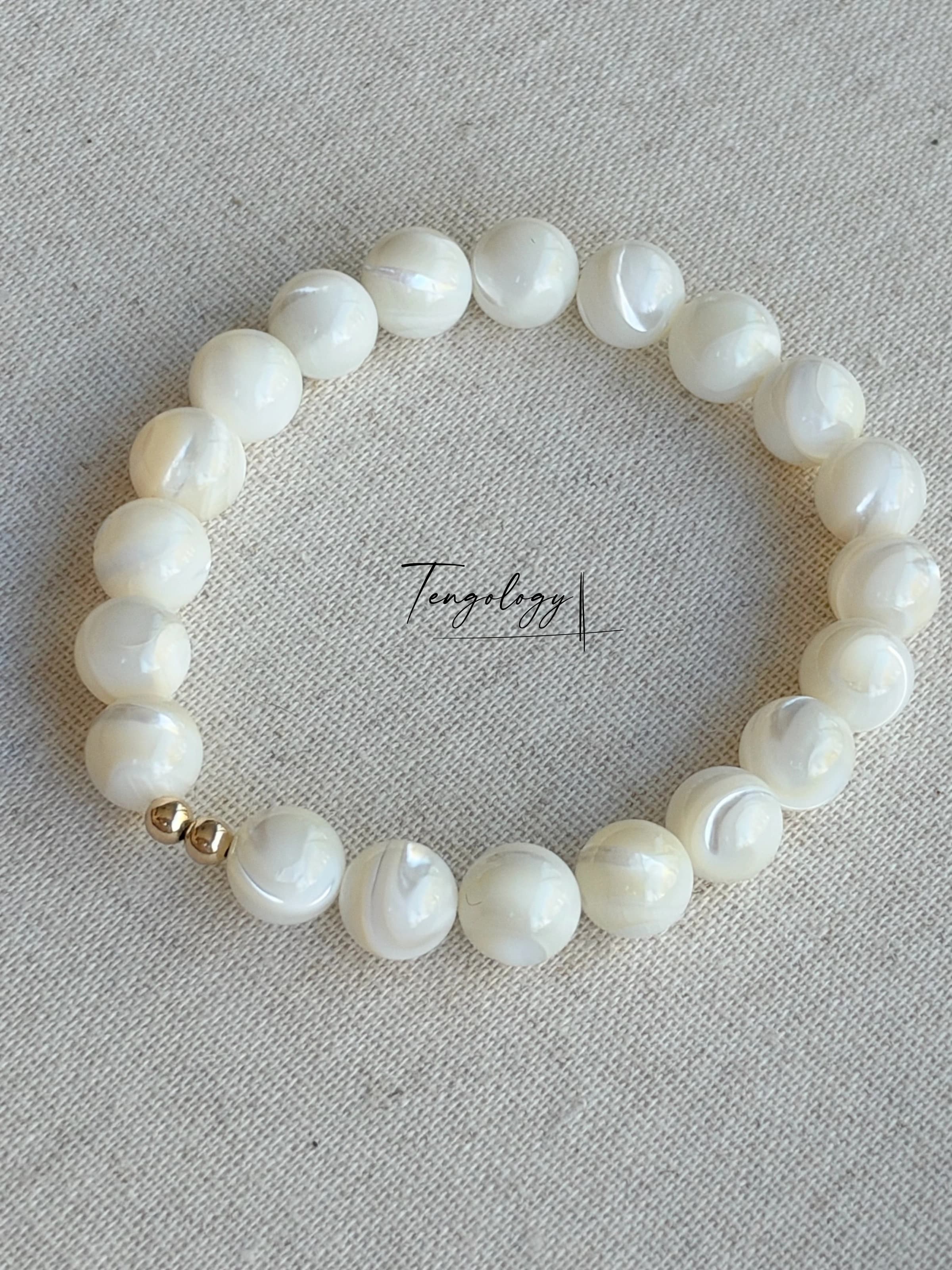 Orbit Grande — Mother of Pearl bead bracelet