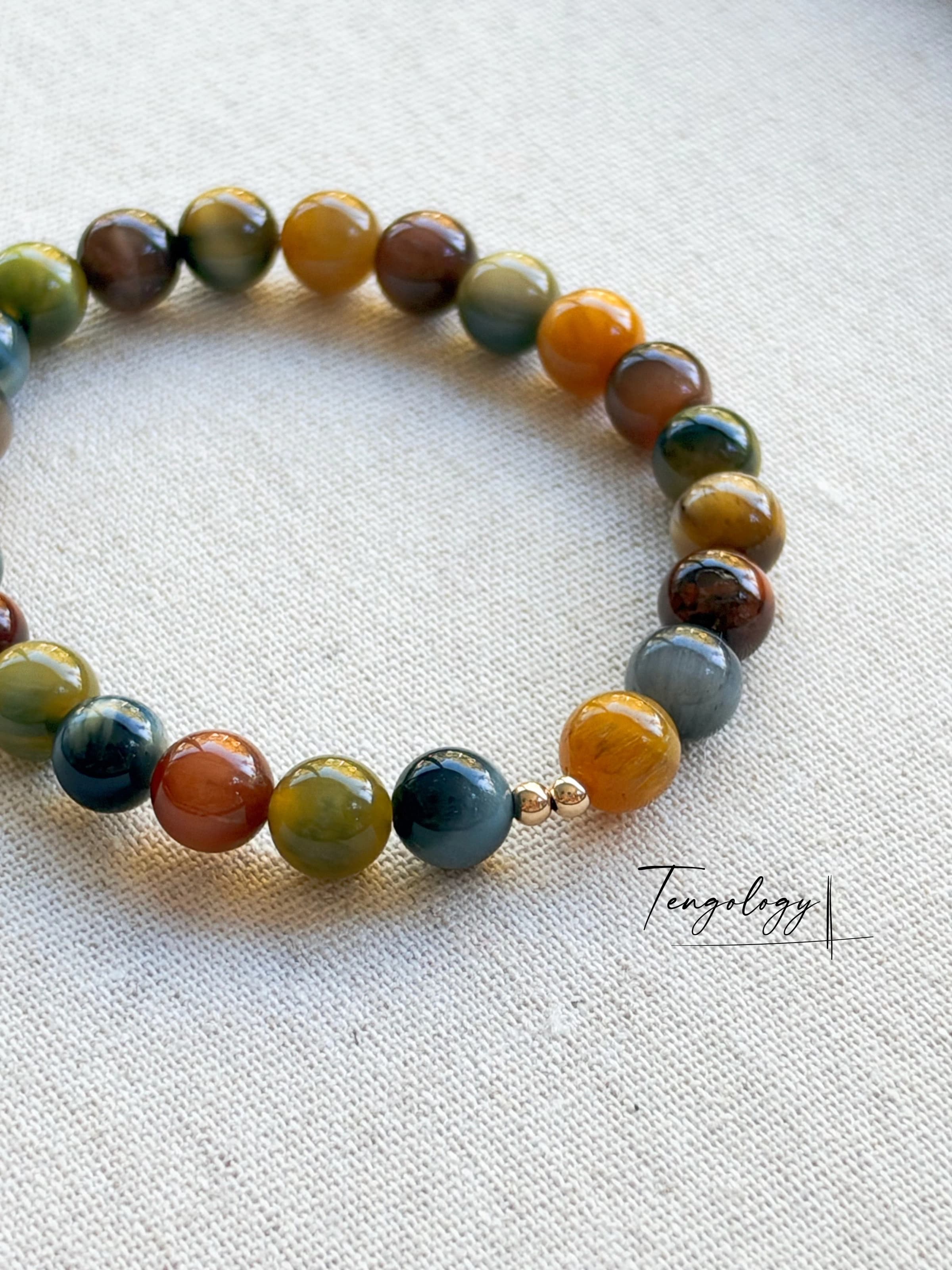 Orbit — Multicolour Tiger’s Eye crystal bracelet