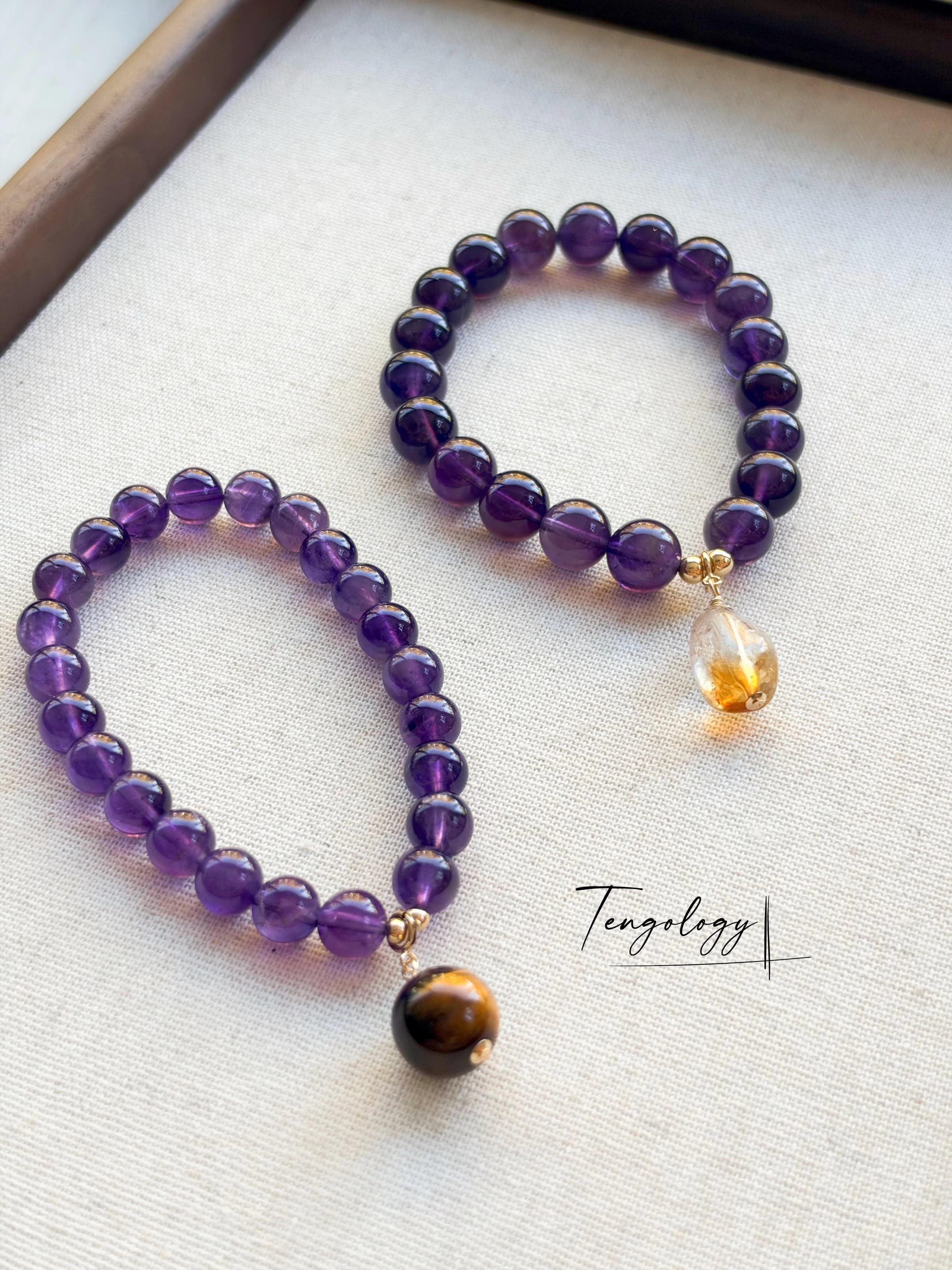 Pair with intention — Orbit — Amethyst pairing example. Bracelets and charms sold separately.