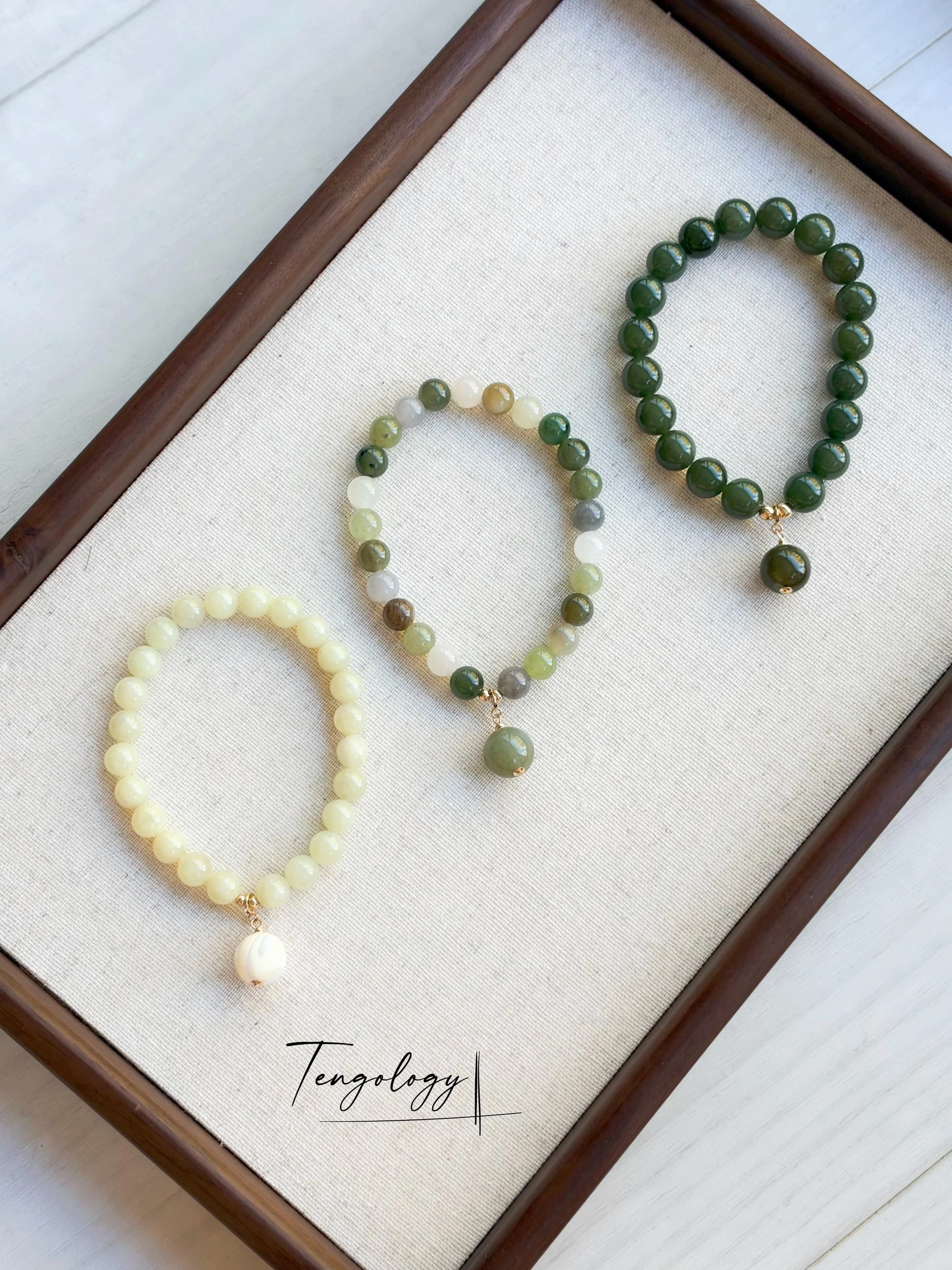 Pair with intention — Planet — Hetian Jade — Dark Green pairing example. Bracelets and charms sold separately.