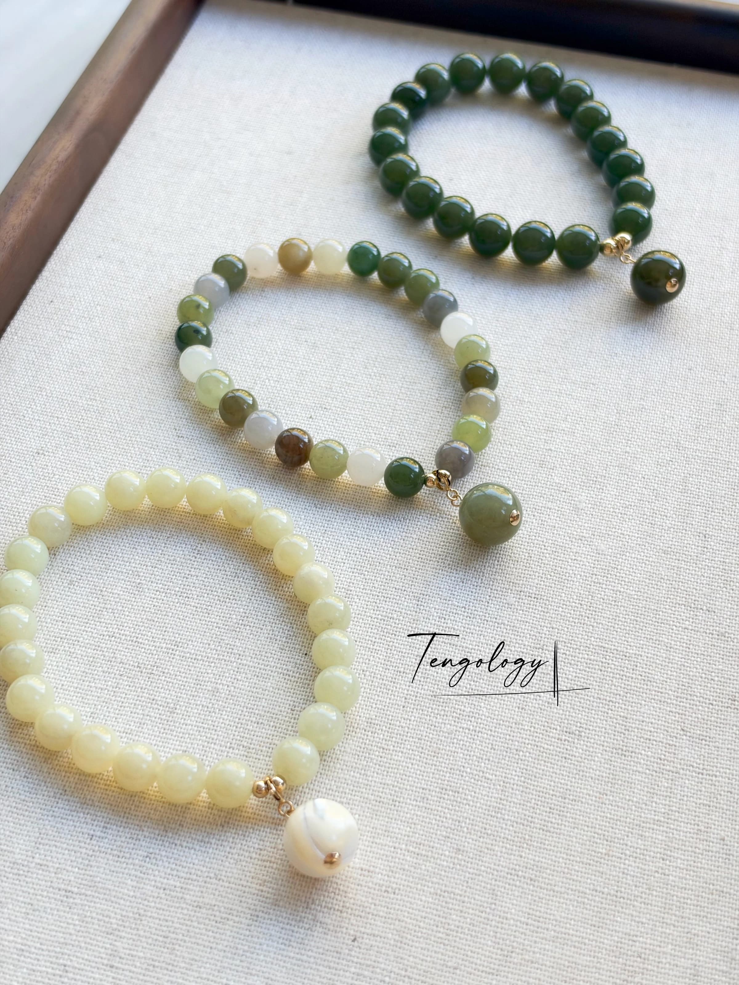 Pair with intention — Planet — Hetian Jade — Dark Green pairing example. Bracelets and charms sold separately.