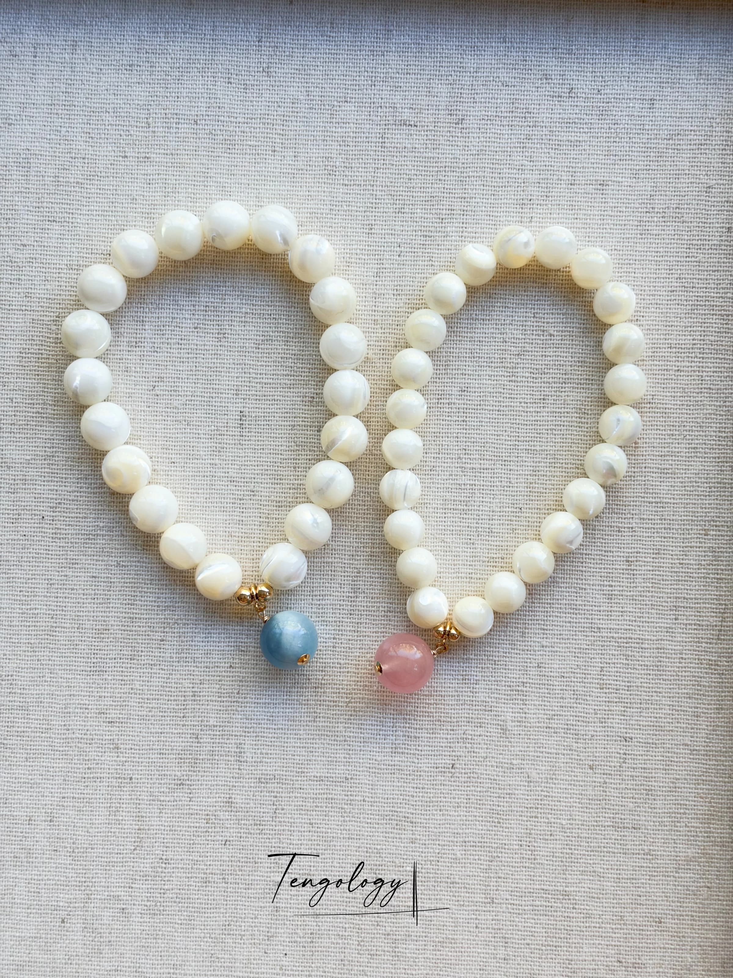Pair with intention — Planet — Aquamarine pairing example. Bracelets and charms sold separately.