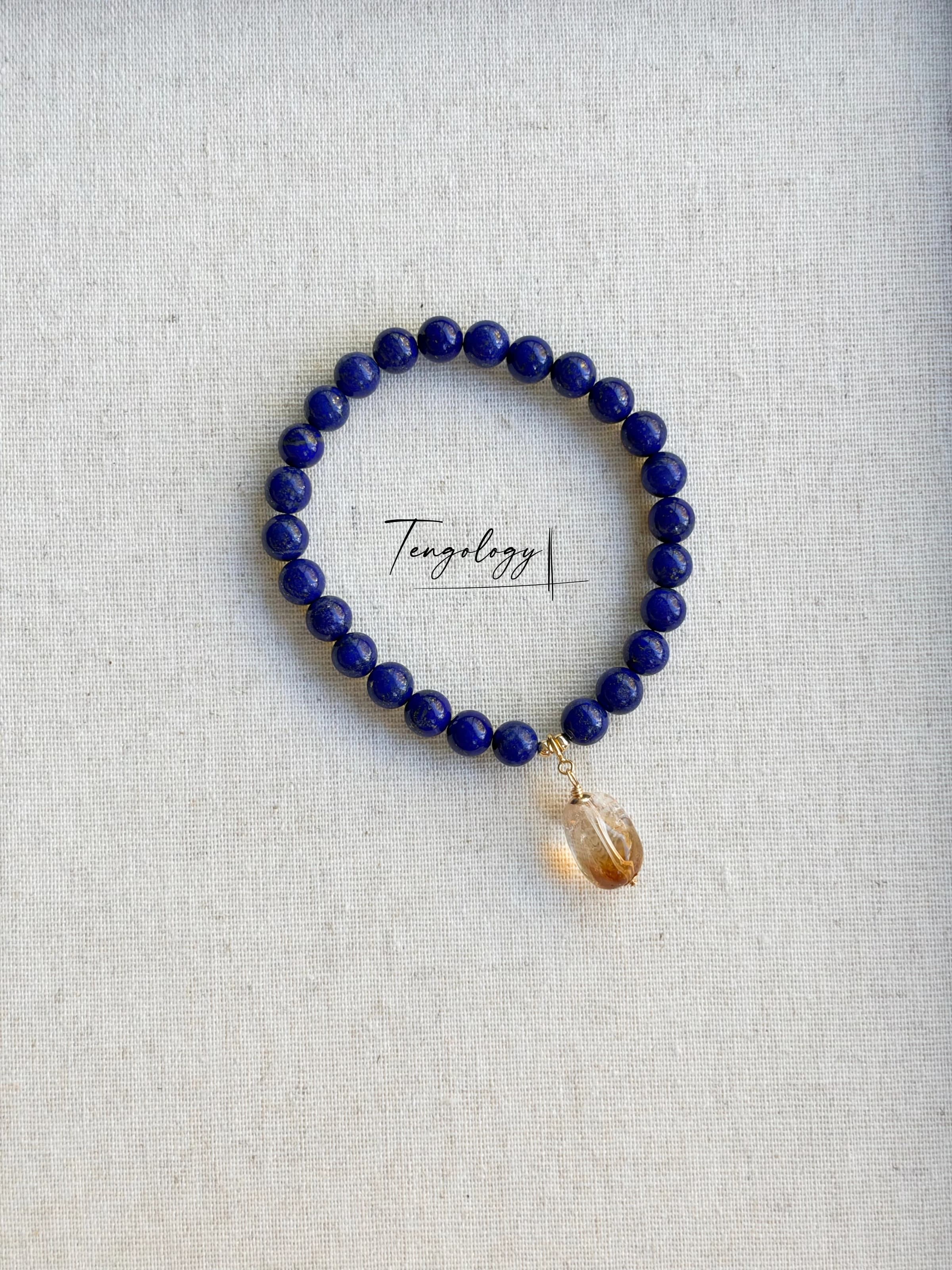 Pair with intention — Asteroid — Citrine pairing example. Bracelets and charms sold separately.