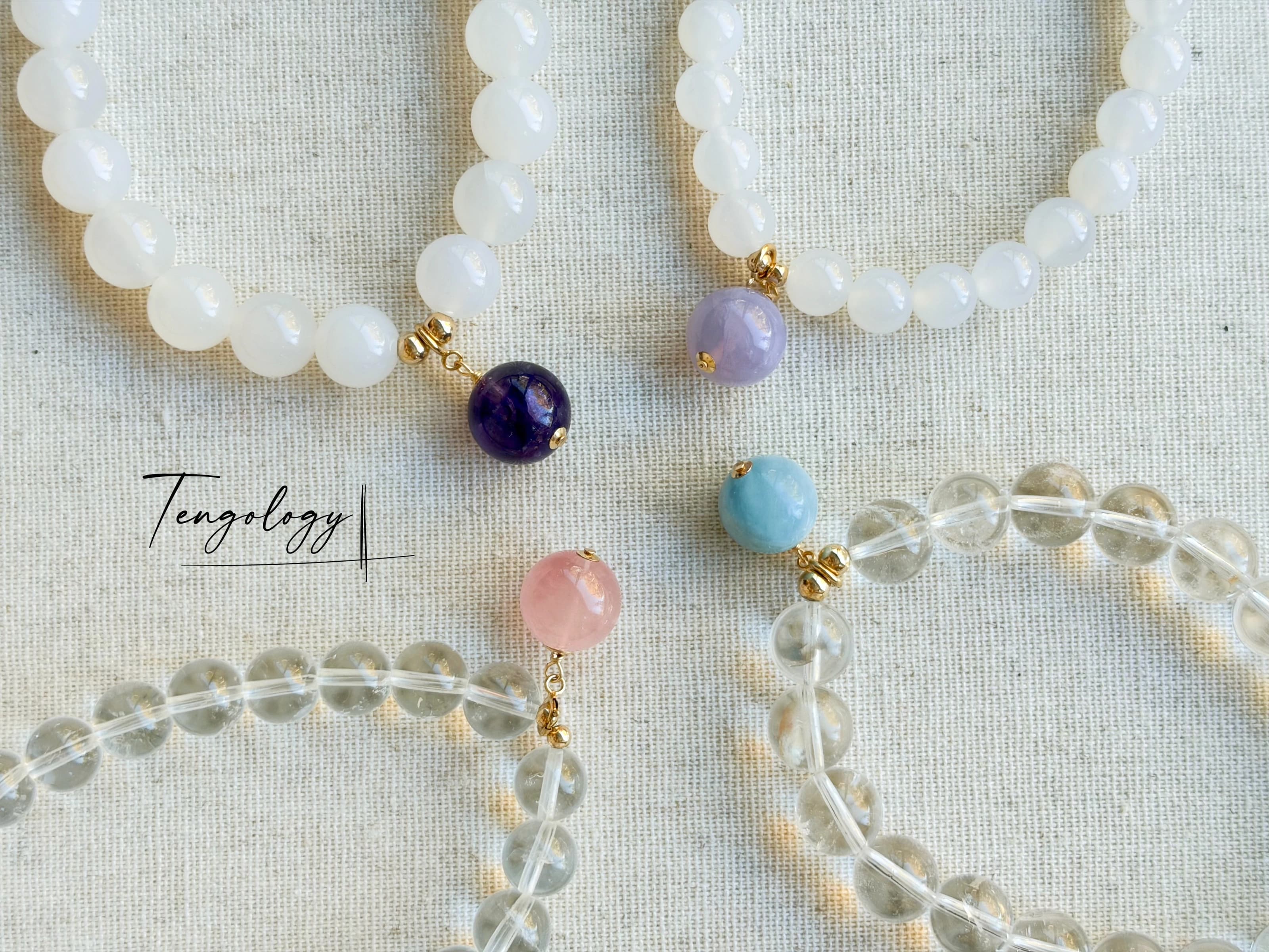 Pair with intention — Planet — Aquamarine pairing example. Bracelets and charms sold separately.
