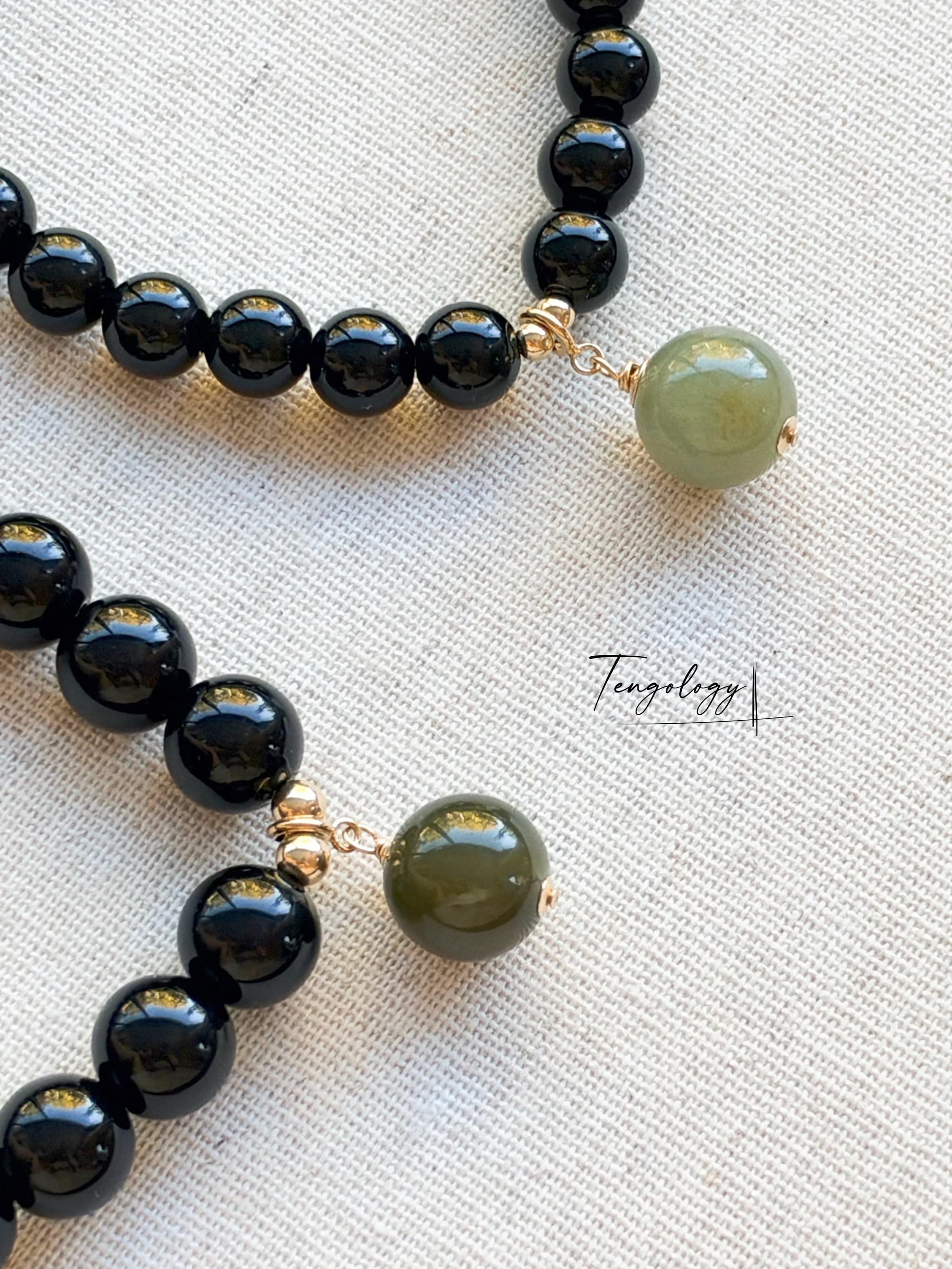 Pair with intention — Planet — Hetian Jade — Dark Green pairing example. Bracelets and charms sold separately.