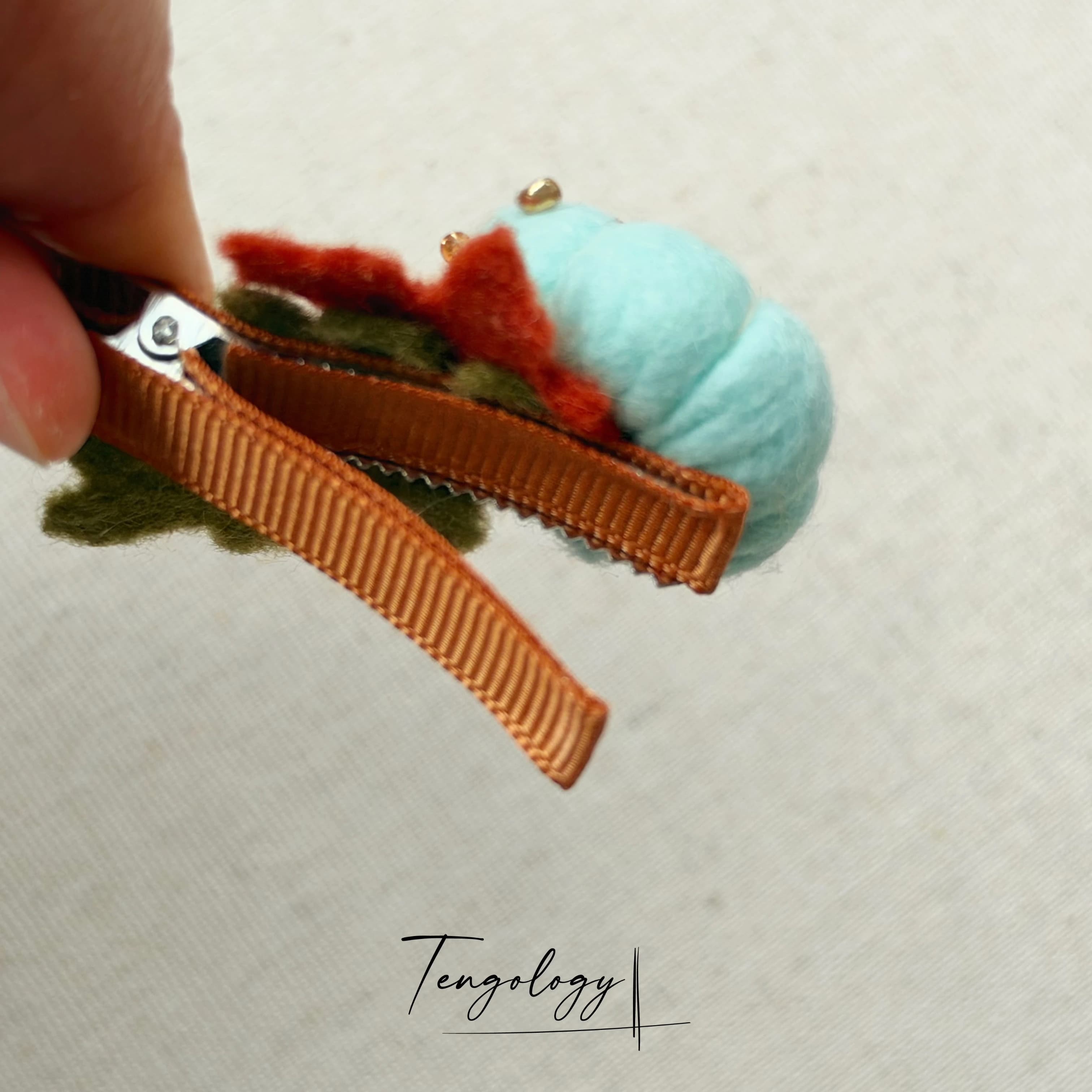 Pumpkin hair clip — product photograph