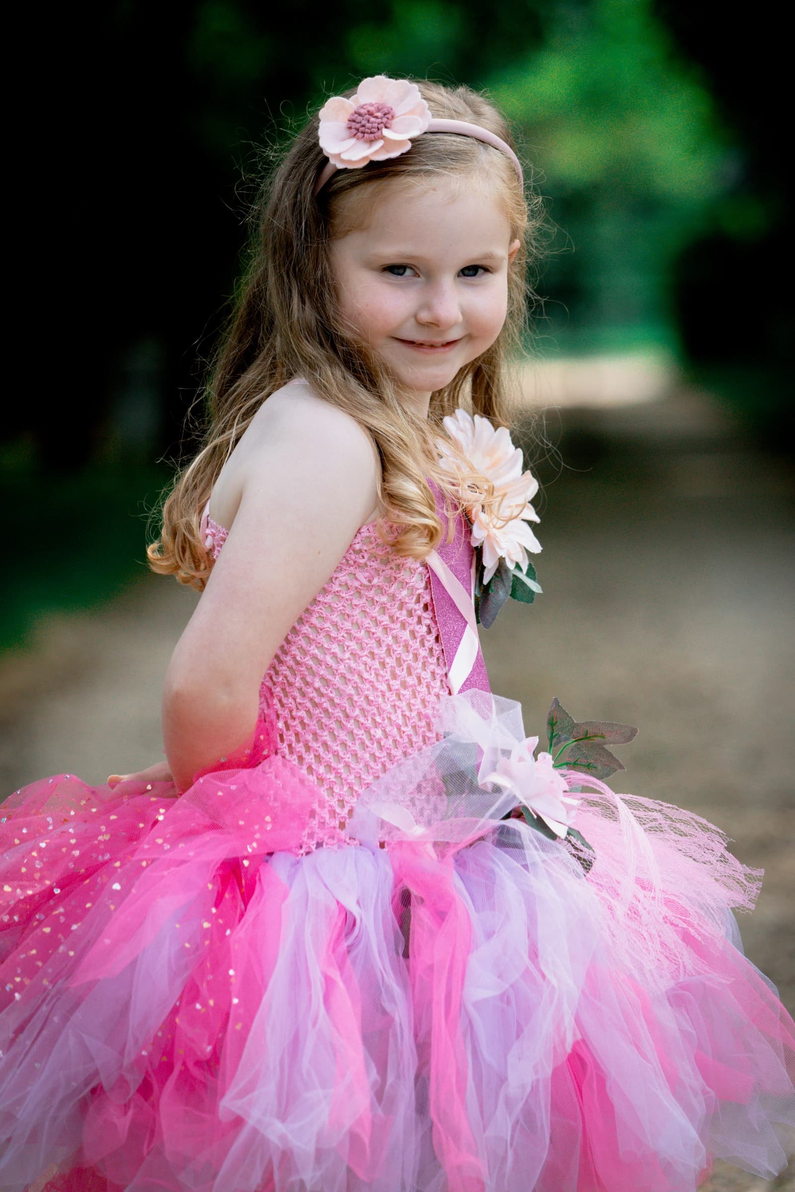 Single Flower Headband — model wearing the pink flower headband