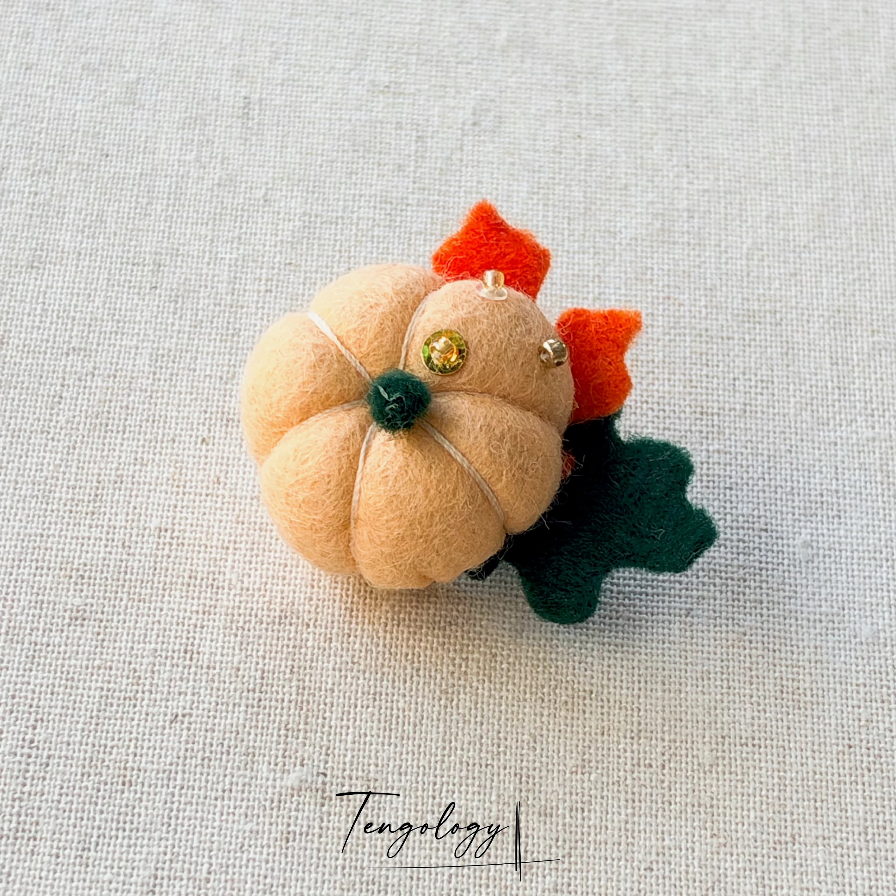 Single Pumpkin Brooch — Peach, front view