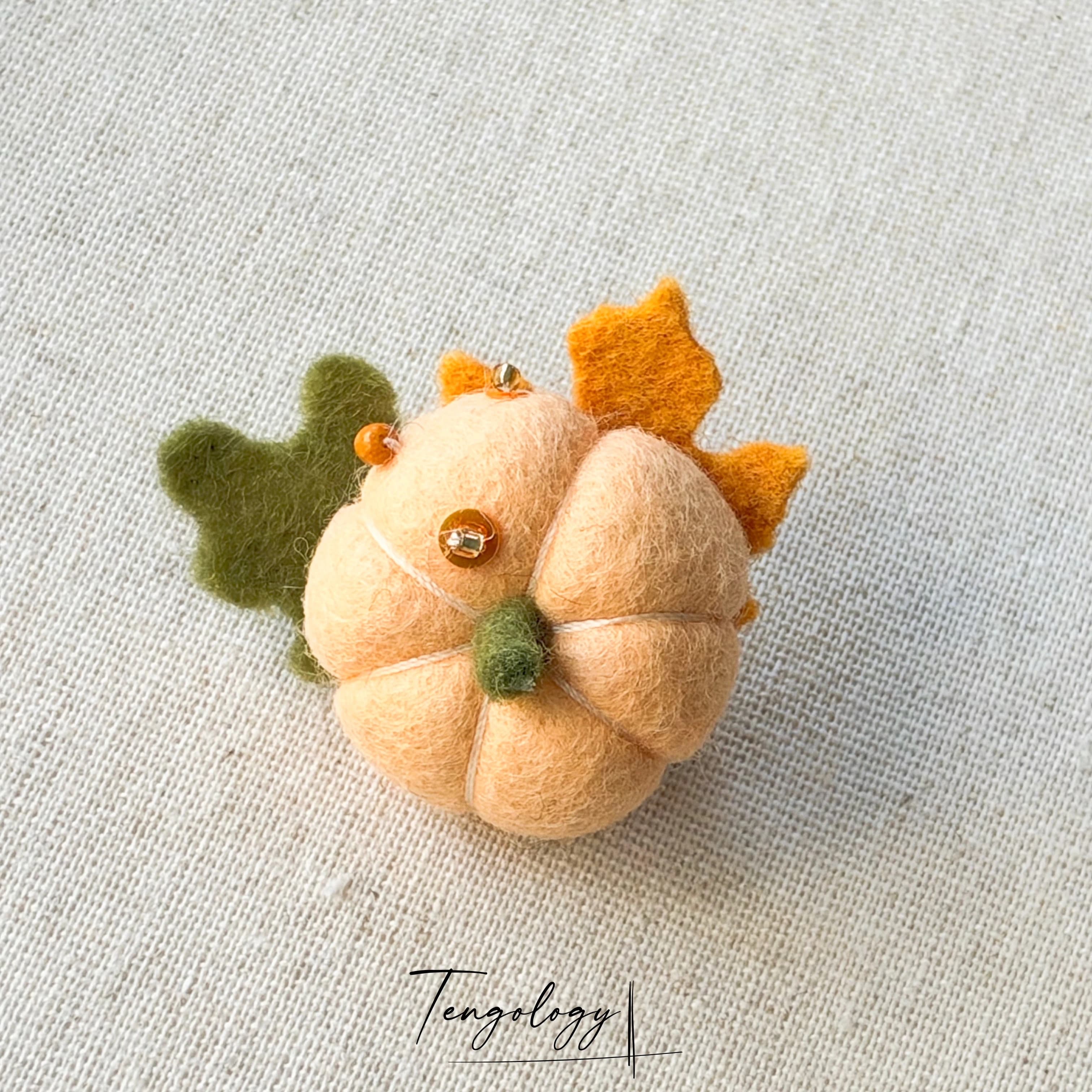 Single Pumpkin Brooch — Cream, front view